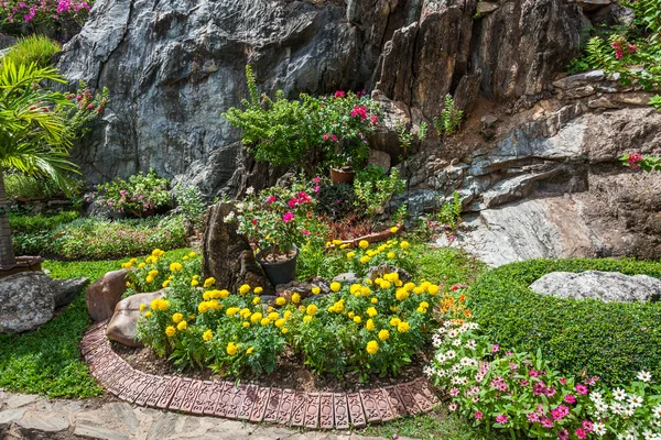 Colourful Flowerbeds and Winding Grass Pathway in an Attractive — Stock Image Colourful Flowerbeds and Winding Grass Pathway in an Attractive Stock Picture