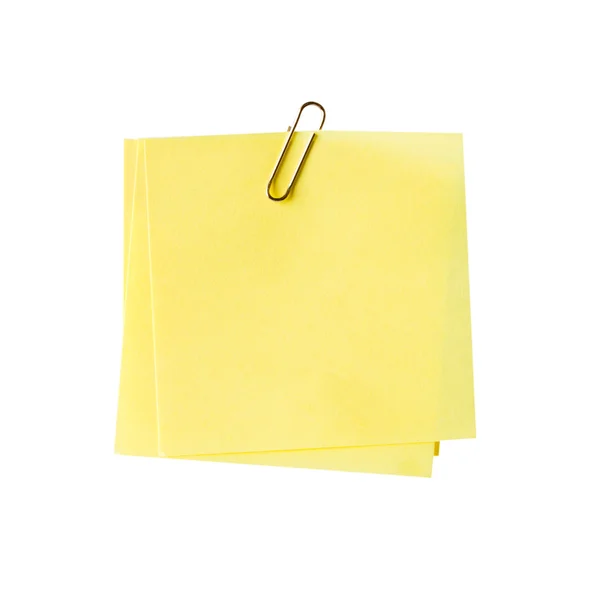 Blank yellow note and clip on isolated white — Stock Photo, Image