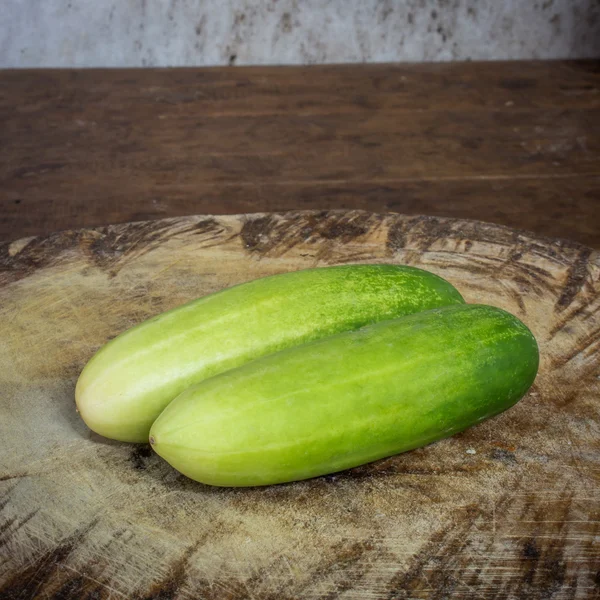 Cucumber fruit on wood table — Stock Photo, Image