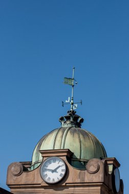 clocks on the top of old building in Prague