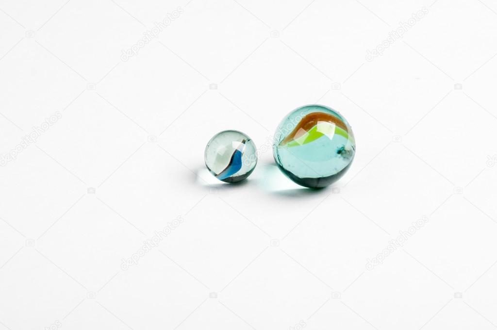 glass marbles on the white background