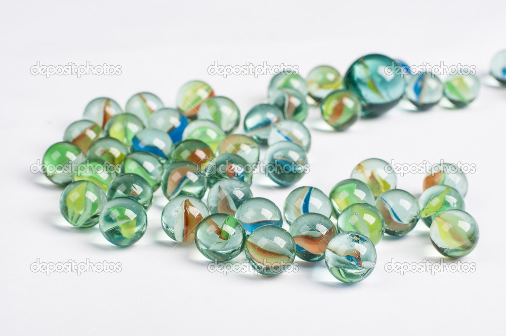 glass marbles on the white background