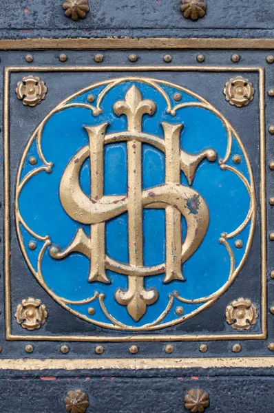 Vintage golden blue symbol that looks like dollar symbol — Stock Photo, Image
