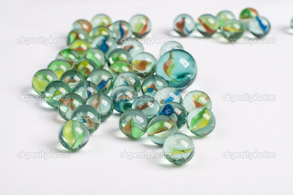 glass marbles on the white background