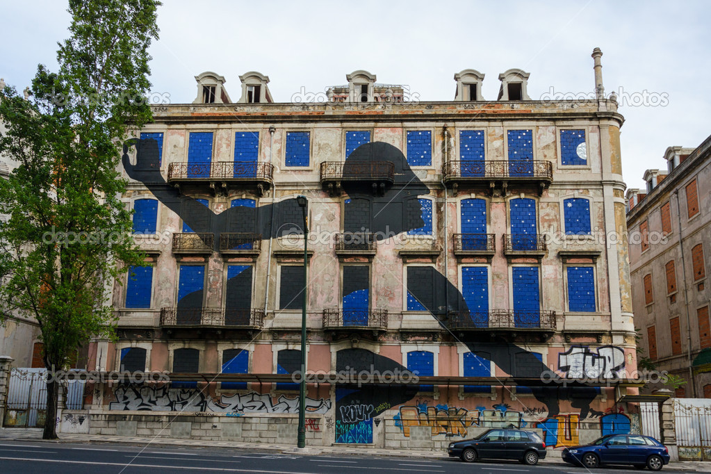 Graffiti on a brick wall of an old house