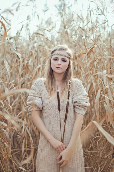 Beautiful blond girl with a mirror in the reeds — Stock Photo, Image