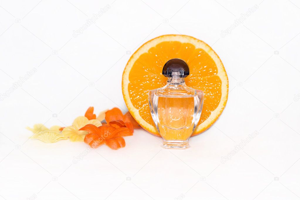 Bottle of aromatic essence and fresh orange