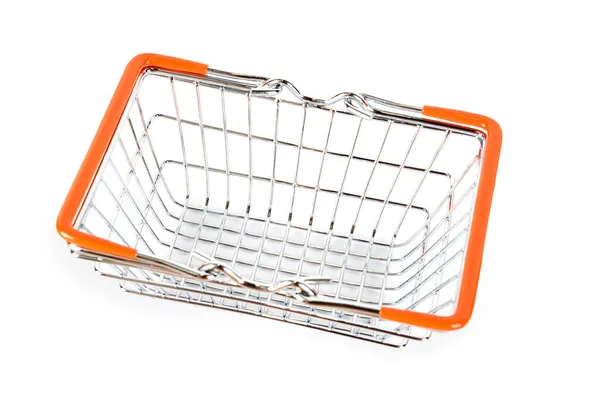 Supermarket shopping basket on light background. Empty metal wire basket. Black friday, sale, shopping concept. Sustainable lifestyle — Stock Photo, Image