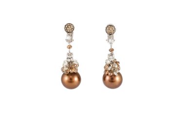 Pair of earrings with pearls isolated on white. Luxury jewelry.