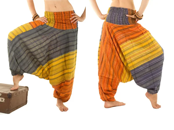 Hint desen ile çok renkli harem pantolon Stok Fotoğraf