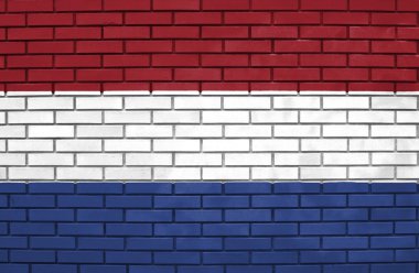 tuğla duvar üzerine Hollanda bayrağı