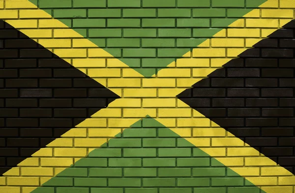 牙买加在砖墙上的旗子 — 图库照片