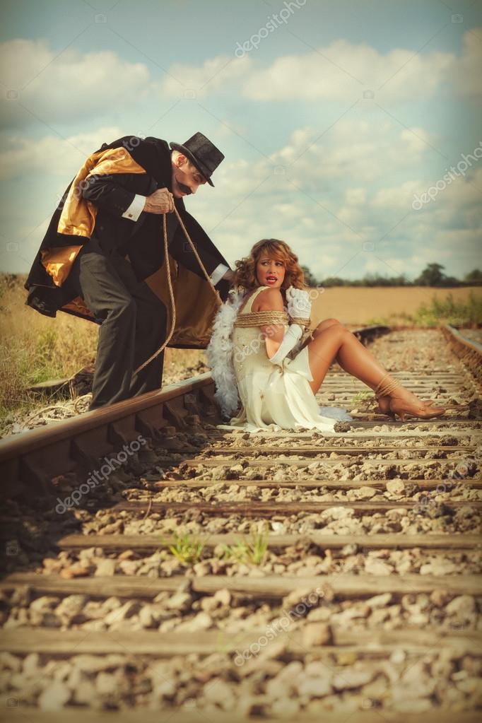 Girl Tied To Tracks