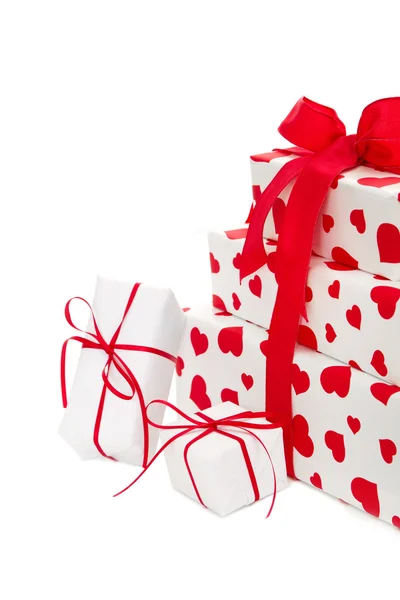 Giftboxes zawinięte w papier serca wzorzyste — Zdjęcie stockowe