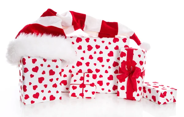 Santa's hat with gift box — Stock Photo, Image