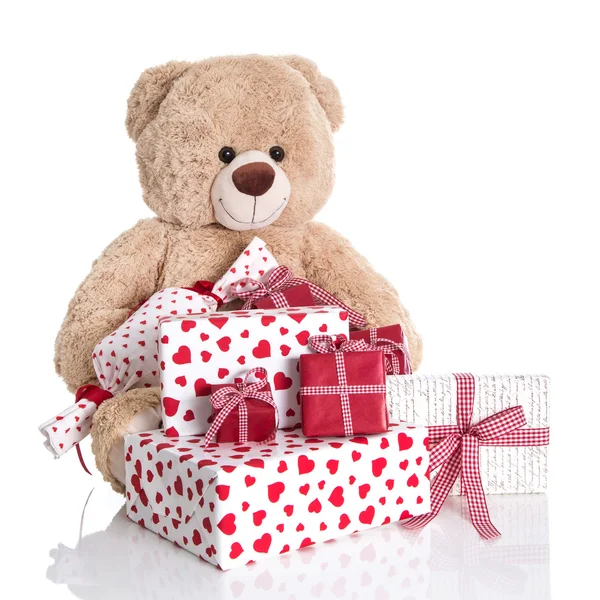 Teddy bear with presents — Stock Photo, Image