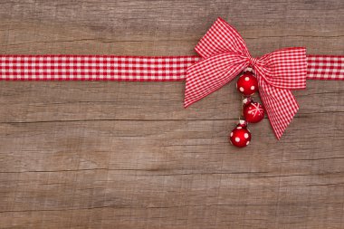 Christmas background with a checked ribbon clipart