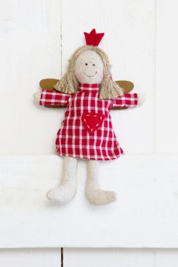 Kırmızı Noel veya koruyucu melek