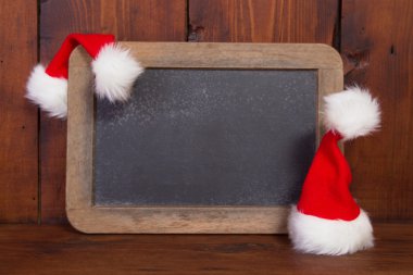 Noel Baba şapkası ile yazı tahtası