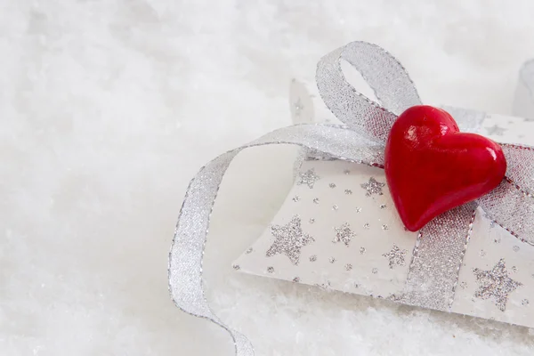 White and silver present box with red heart — Stock Photo, Image