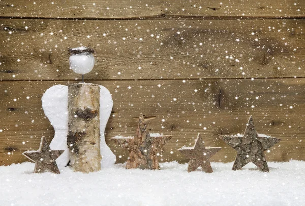 Weihnachtsengel und Holzsterne — Stockfoto