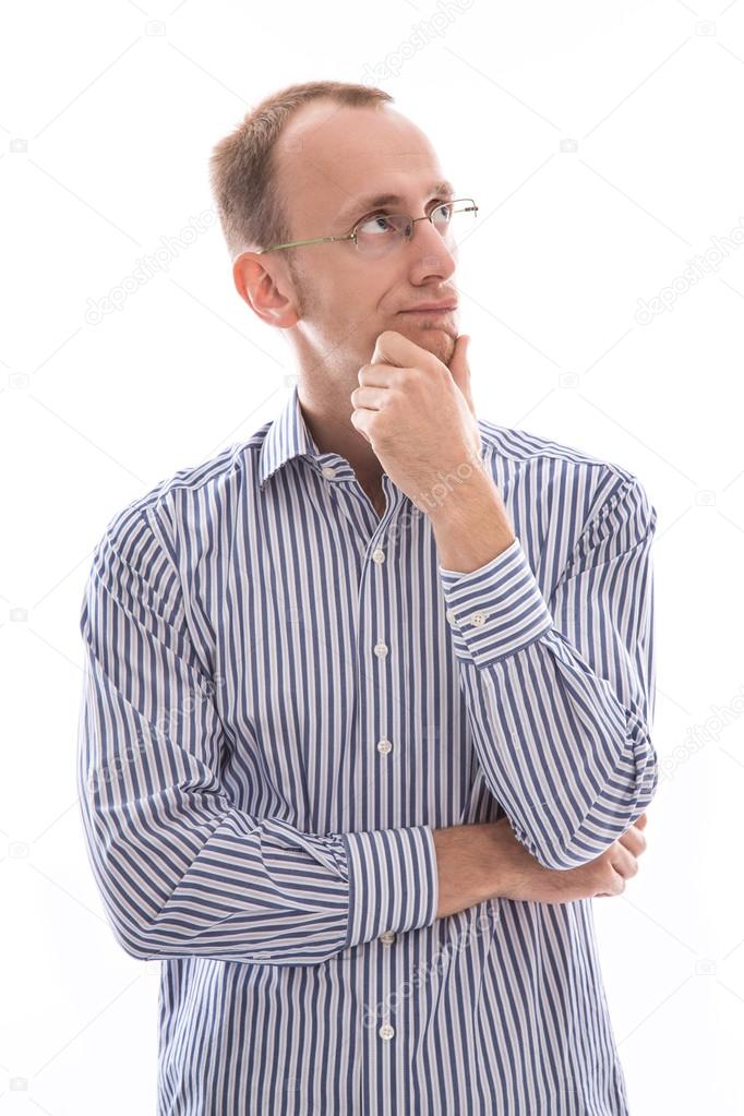 Man with glasses touching chin and skeptical isolated