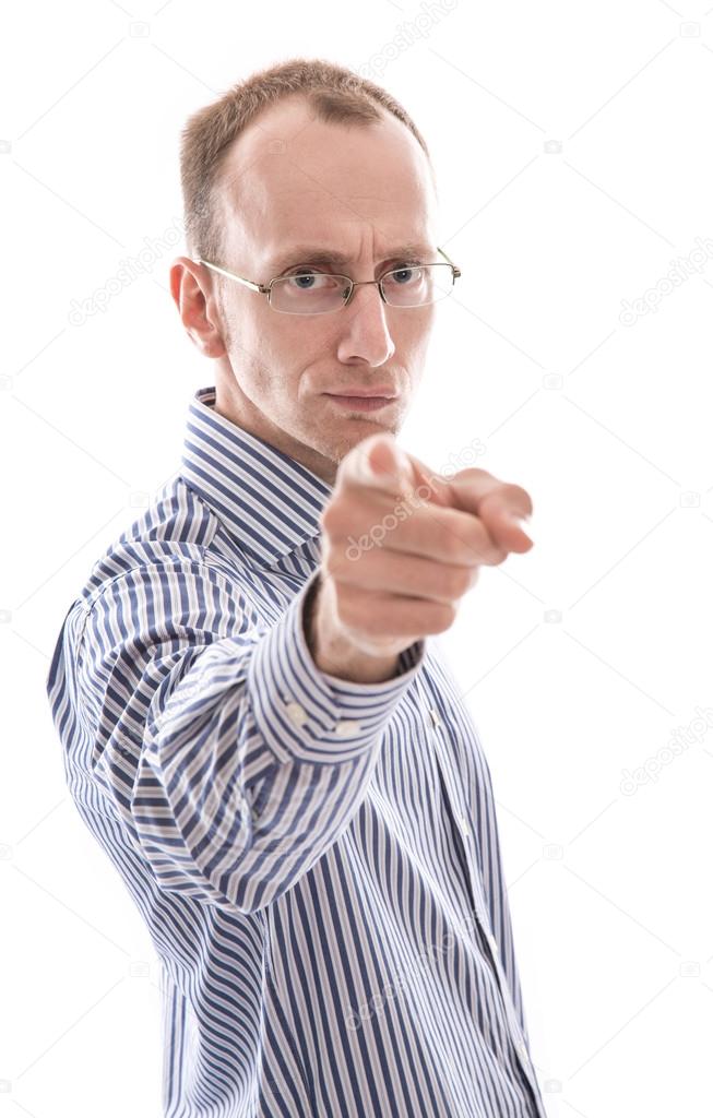 Business man pointing at camera isolated on white background