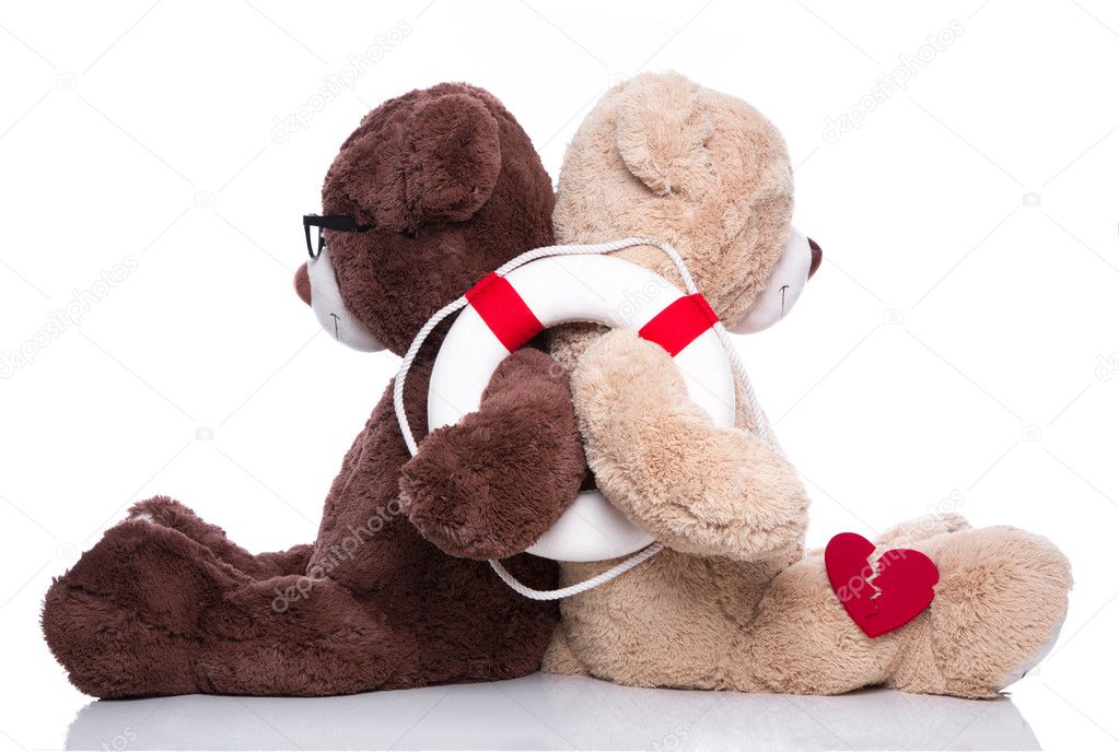Friends help teddy bears back to back