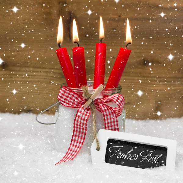 Four red burning christmas candles — Stock Photo, Image