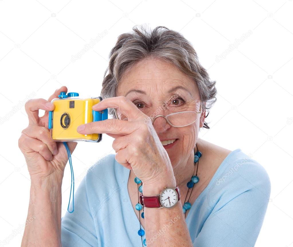 Mature lady with a camera