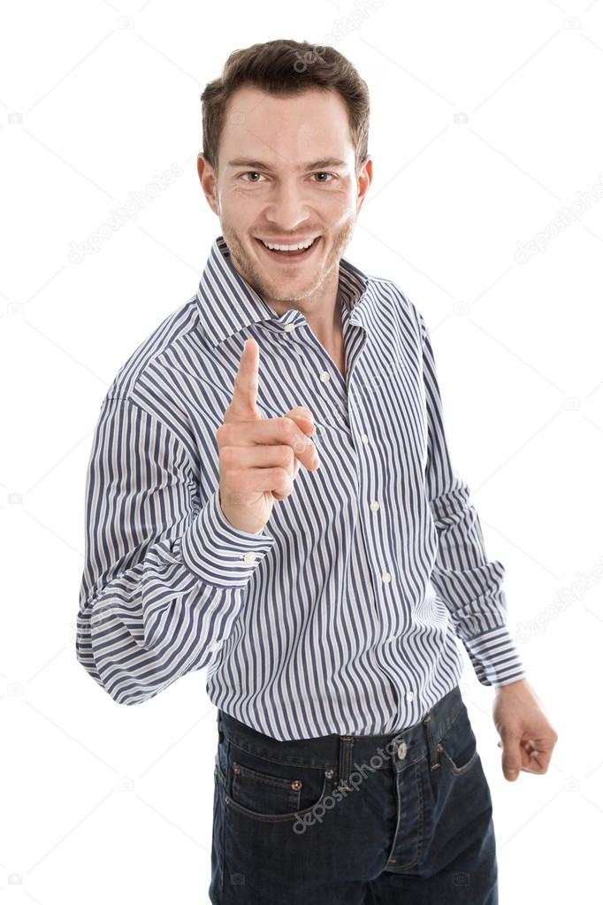 Successful attractive young man in blue pointing finger at camer