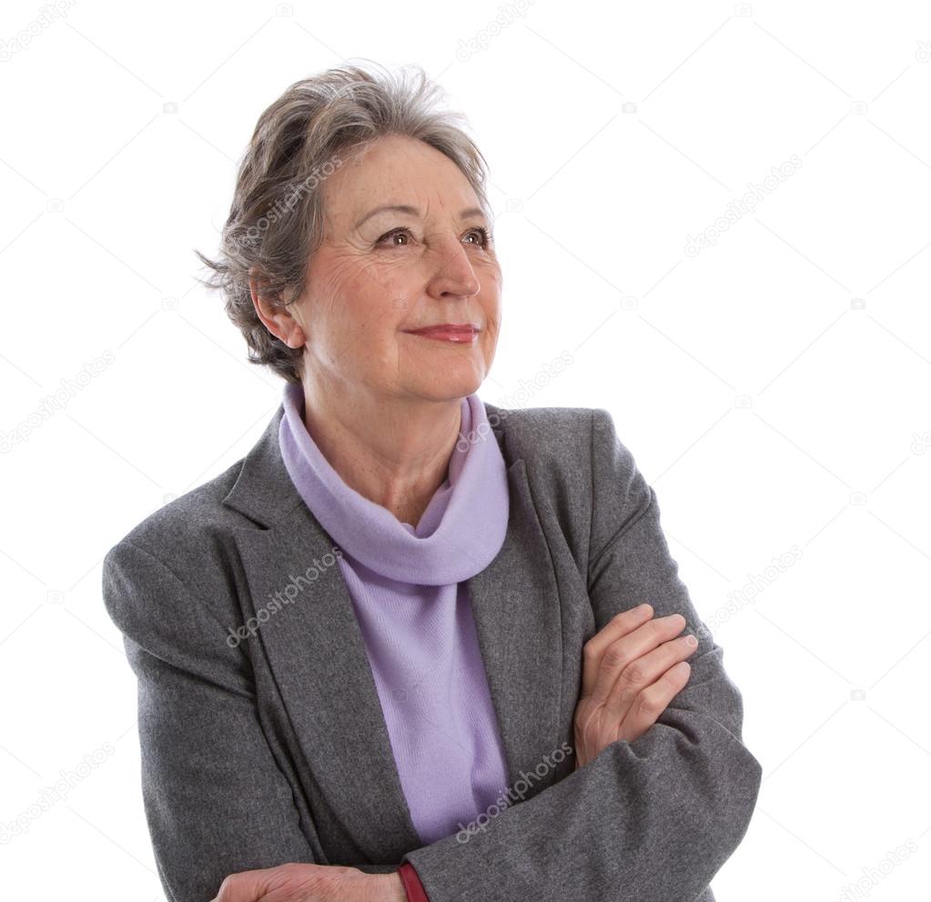 Senior pensive woman with folded arms