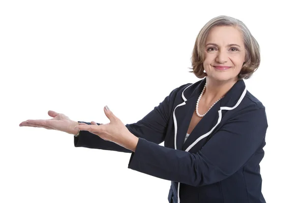 Mature woman presenting something — Stock Photo, Image