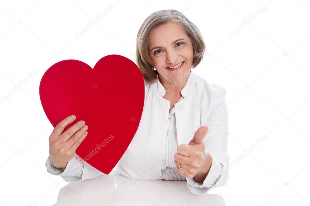 Doctor with heart thumbs up