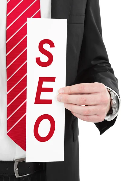 SEO ondertekenen in de hand — Stockfoto