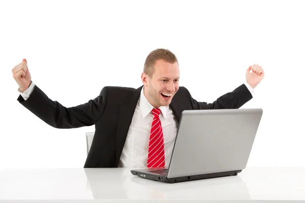 Successful businessman with laptop — Stock Photo, Image