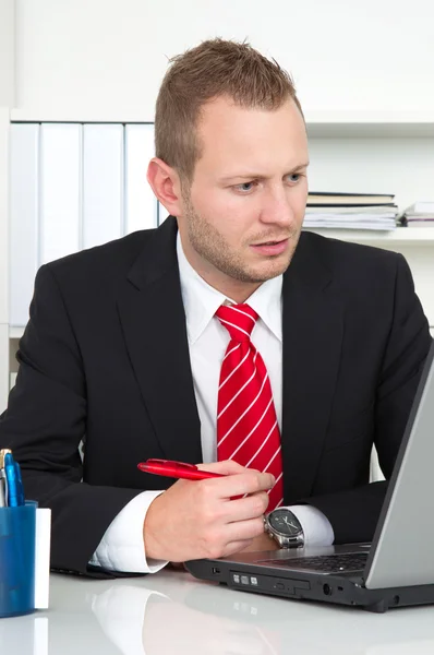 Businesss man with lack of concentration Stock Photo