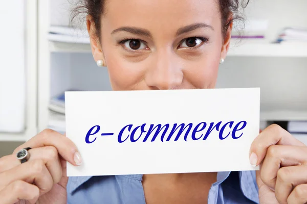Woman with sign e-commerce — Stock Photo, Image