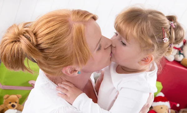 Unconditional love - a Kiss - mother and daughter — Stock Photo, Image