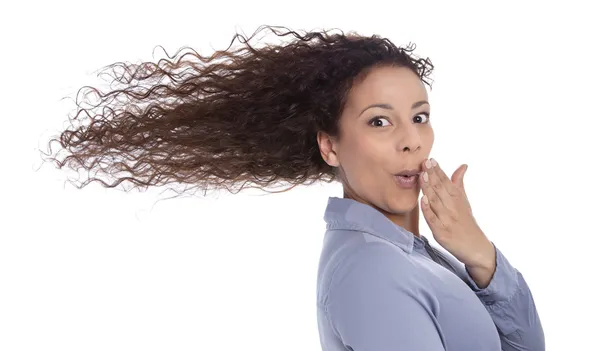 Wietrzny: zaskoczony, kobieta z wiejący wiatr na białym tle włosów — Zdjęcie stockowe