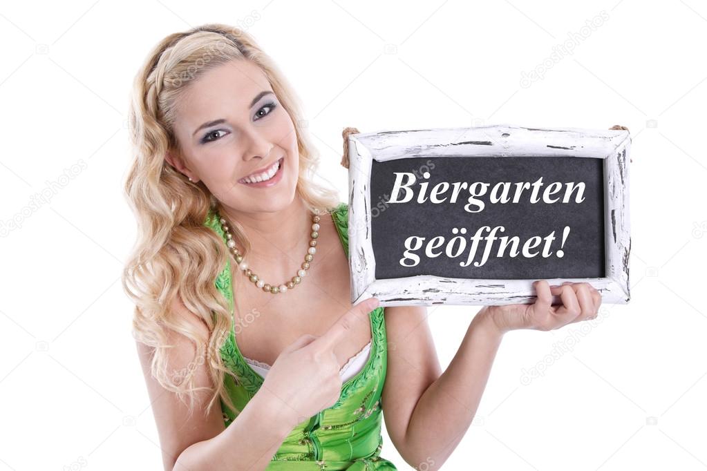 Bavarian woman holding sign