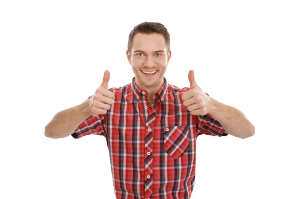 Young man with thumbs up — Stock Photo, Image