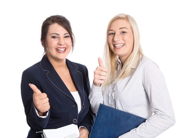 Успешные деловые женщины с большими пальцами вверх и улыбаются на белом — стоковое фото