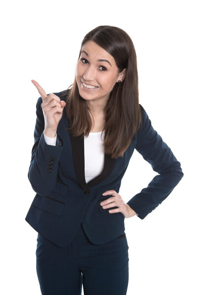 Happy business woman is pointing with forefinger isolated on whi