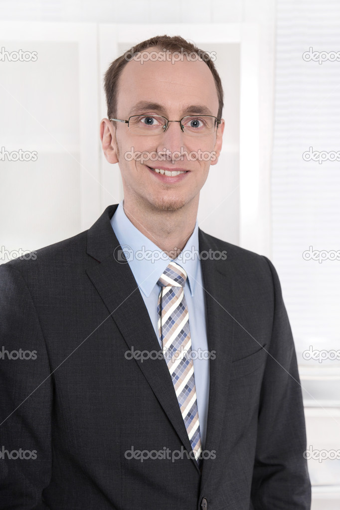 Smiling businessman with glasses