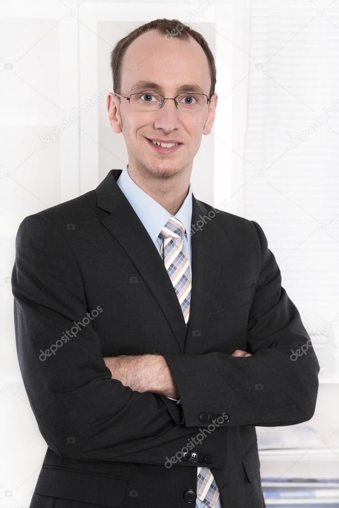 Smiling businessman with glasses