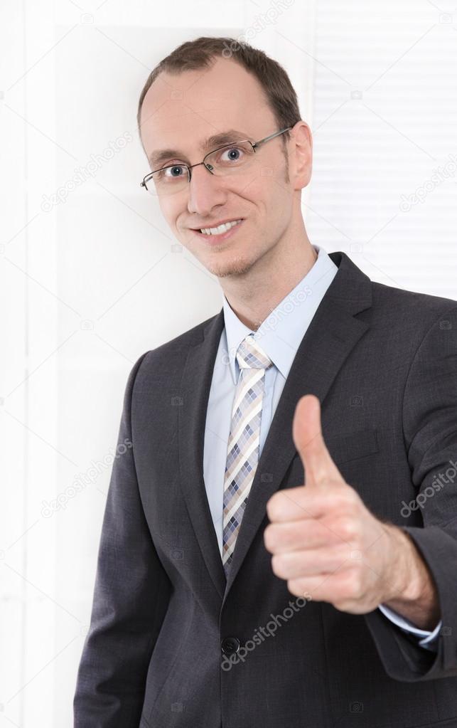 Successful businessman thumbs up