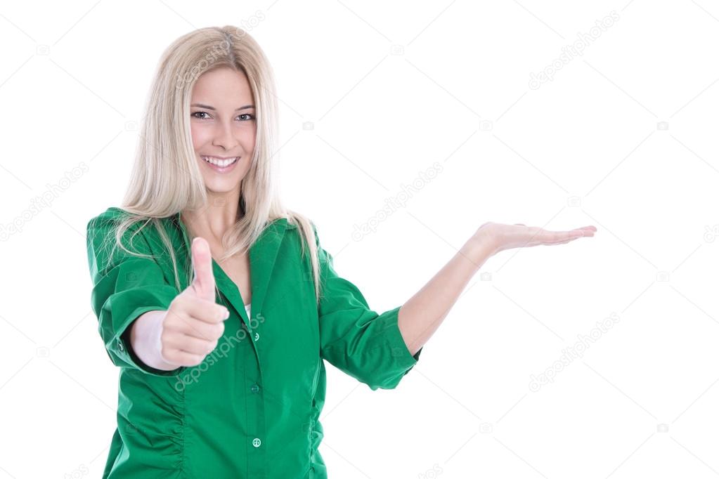 Blond isolated woman in a green blouse and thumbs up.