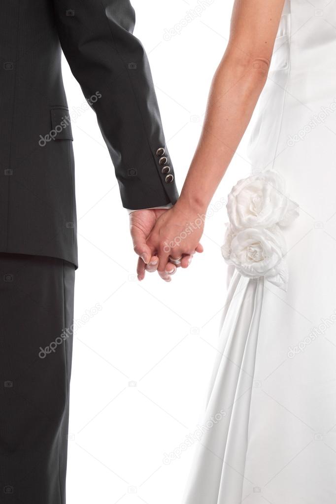 Wedding couple Holding Hands - isolated on White.