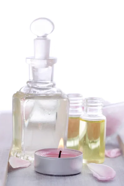 Massage Oil with Candle — Stock Photo, Image